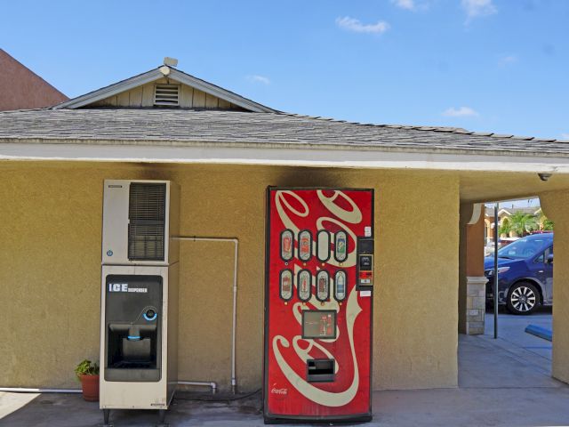 Two vending machines outside a building